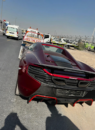 (24/7 Towing Service in Sharjah) Sports car towing (24/7 towing service in Sharjah providing fast car towing, roadside assistance, and emergency recovery. Call now for immediate help.)